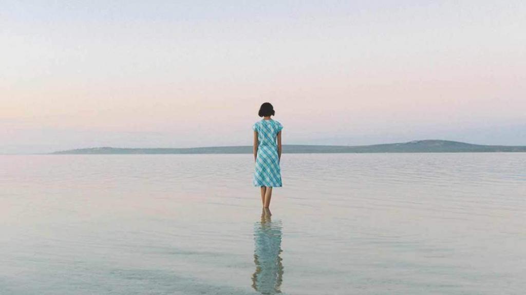 a woman walking alone and feeling depressed