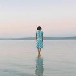 a woman walking alone and feeling depressed