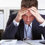 man under stress at work due to ADHD