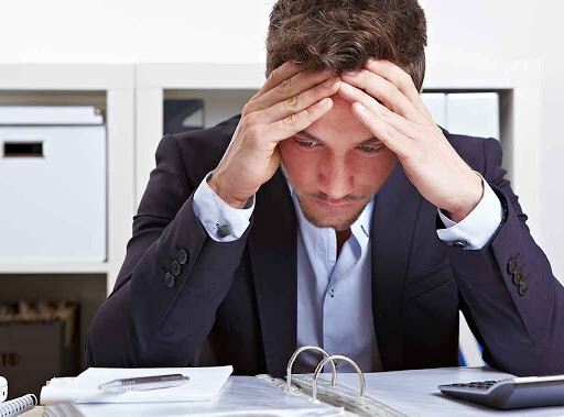 man under stress at work due to ADHD
