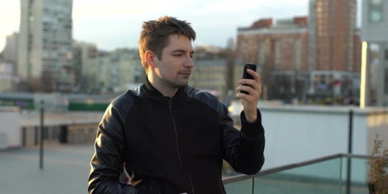 A man looking into his phone