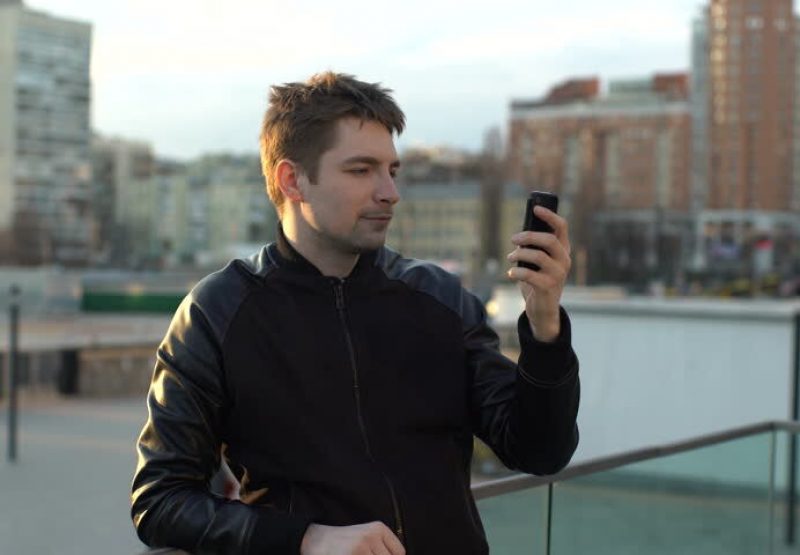 A man looking into his phone