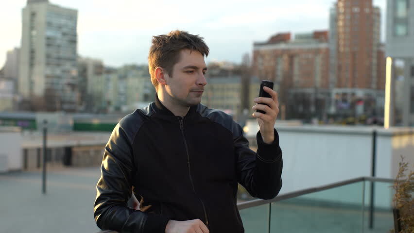 A man looking into his phone